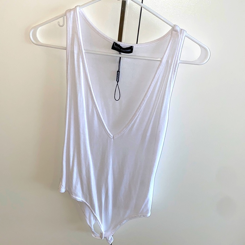 UNWORN bodysuit